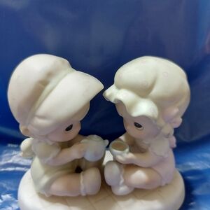 Precious Moments Cream and White Figurine Pair